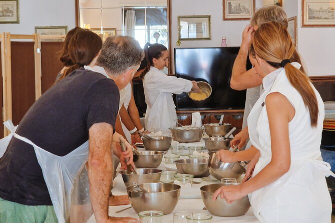 Pasta and Tiramisu Cooking Class in Rome, Piazza Navona - Provided Tools and Aprons