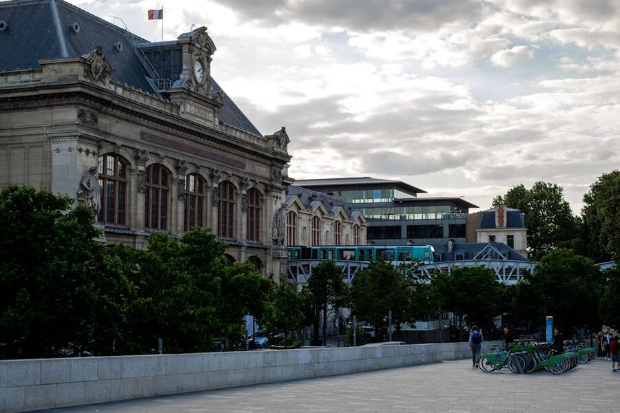 The interior concourse of Gare Saint Lazare station in Paris with its high ceiling and platforms