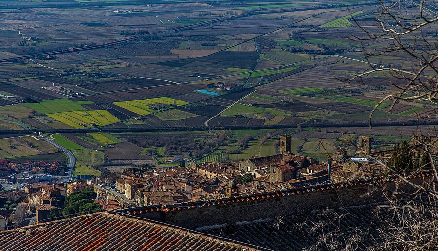 View over Cortona rooftops and the Val di Chiana from above