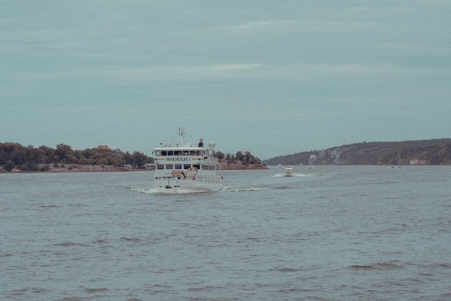A passenger ferry crossing the Stockholm archipelago with islands and forest in the background