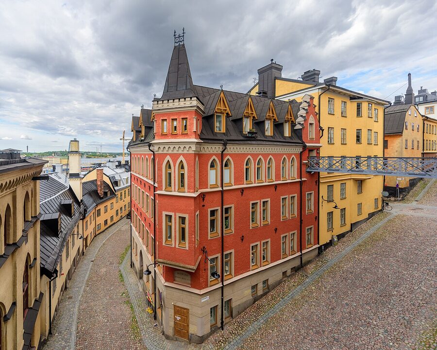 Bellmansgatan in summer Söder Stockholm with green trees framing the apartment block