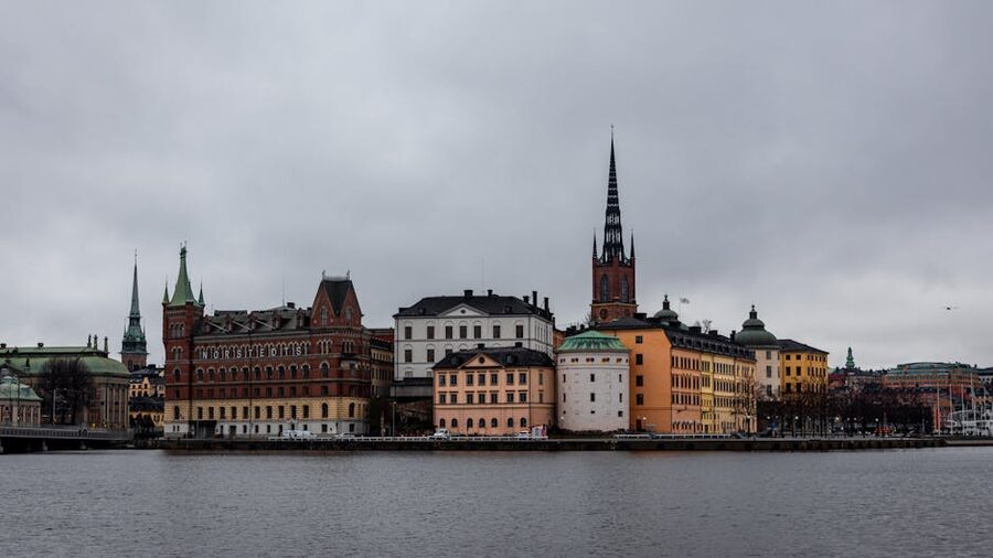 The skyline of central Stockholm with Riddarholmen church and old town reflected in calm water