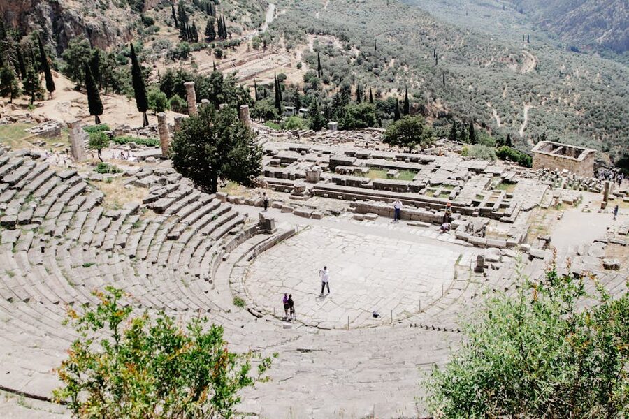 The ancient stone seating and ruined stage of the Theatre of Dionysus on the south slope of the Acropolis