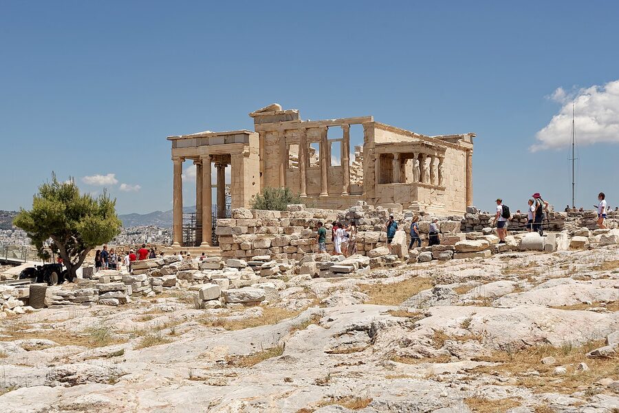 The Erechtheion temple on the Acropolis of Athens showing the porch and surrounding ruins