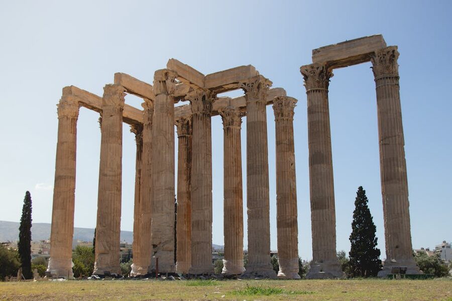 The remaining columns of the Temple of Olympian Zeus in central Athens against a blue sky