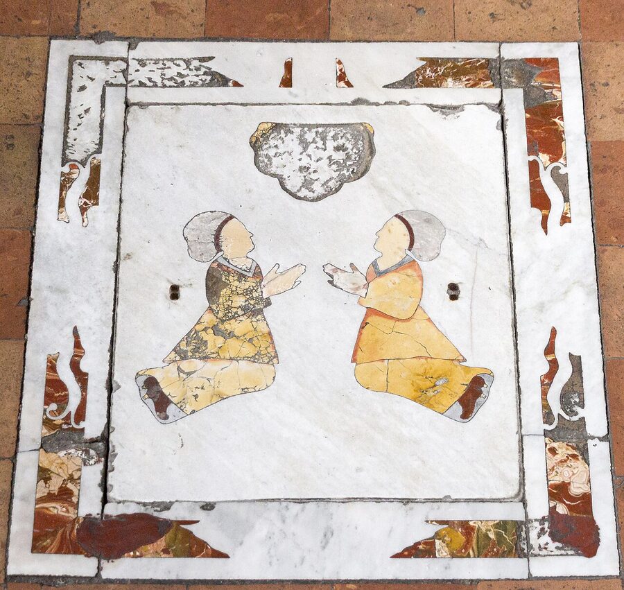 The interior of Abbazia di San Michele Arcangelo on Terra Murata in Procida showing the painted ceiling and altar