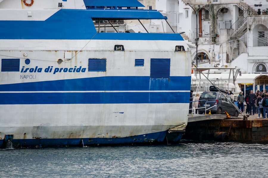 A passenger ferry docked at the harbour of Procida island in the Bay of Naples